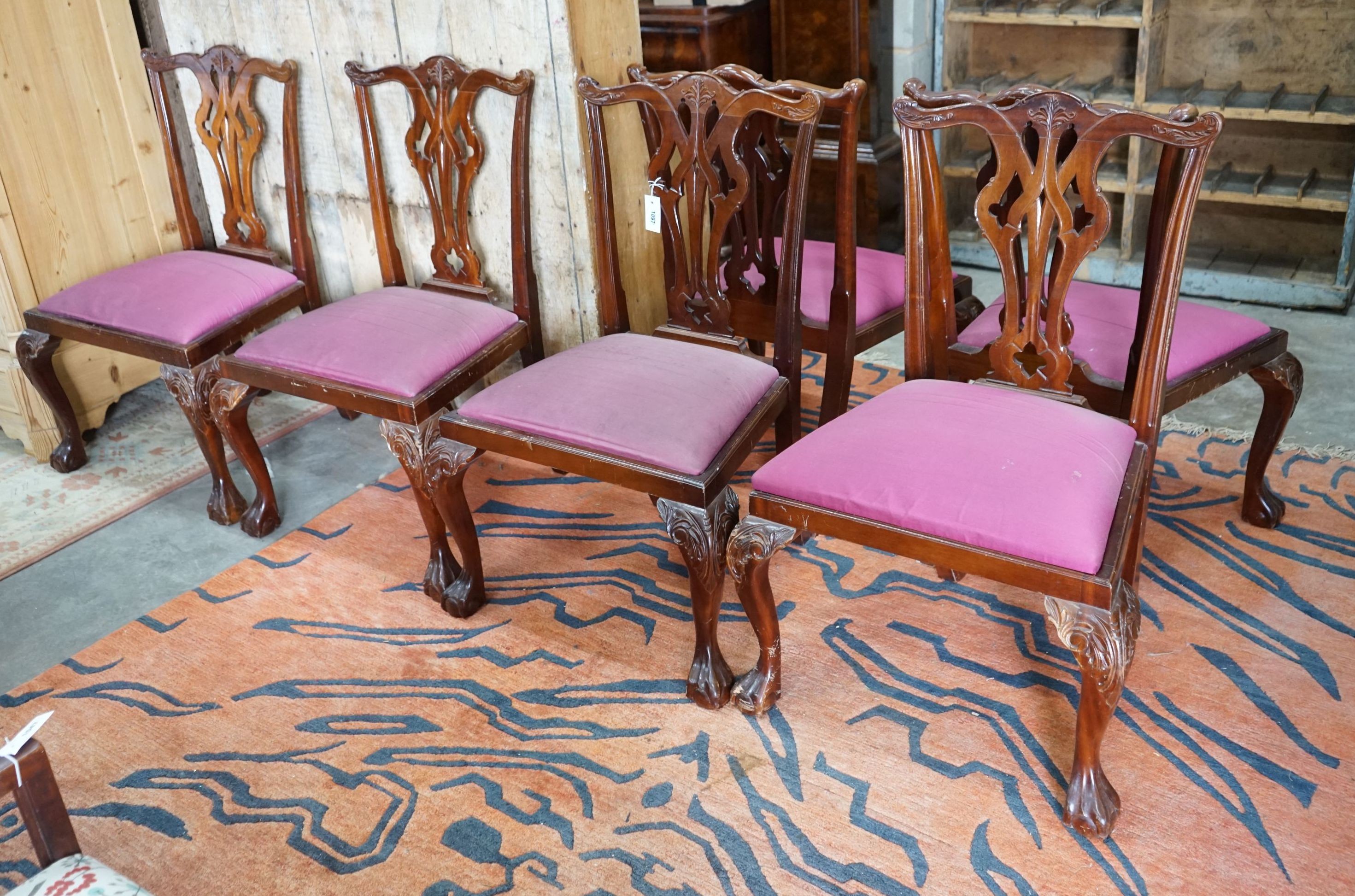 A set of six reproduction George III style mahogany dining chairs, width 64cm, depth 50cm, height 98cm